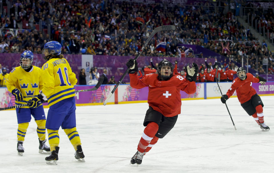 Phoebe Stanz of Switzerland (88) reacts after scoring a goal against Sweden during the third period of the women's bronze medal ice hockey game at the 2014 Winter Olympics, Thursday, Feb. 20, 2014, in Sochi, Russia. (AP Photo/Matt Slocum)