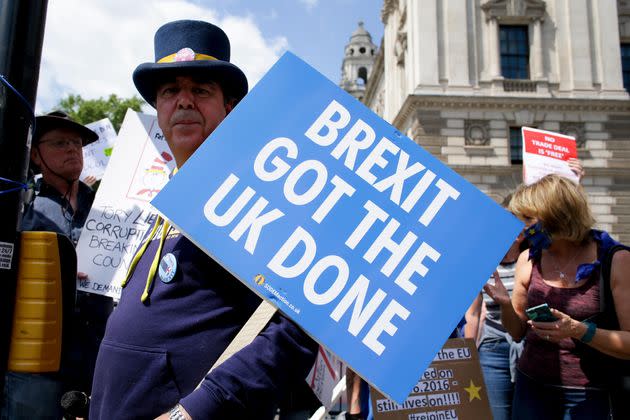 Anti-Brexit activists marking the fifth anniversary of the UK's EU membership referendum demonstrate outside the Houses of Parliament. (Photo: Anadolu Agency via Getty Images)