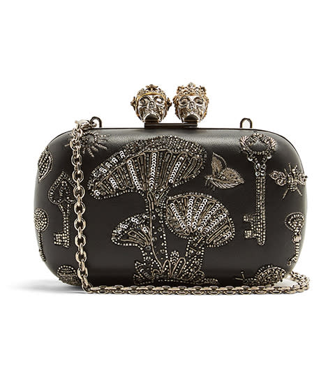 <p><strong>Alexander McQueen </strong>clutch, $2,695, matchesfashion.com</p><p><a rel="nofollow noopener" href="https://www.matchesfashion.com/us/products/Alexander-McQueen-Queen-and-King-skull-embellished-clutch-1172563" target="_blank" data-ylk="slk:BUY NOW;elm:context_link;itc:0;sec:content-canvas" class="link ">BUY NOW</a></p>