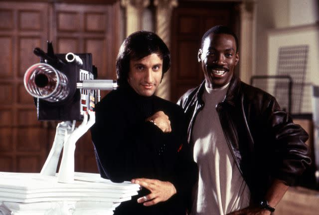 <p>everett collection</p> Bronson Pinchot and Eddie Murphy in 'Beverly Hills Cop III'