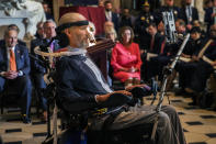 Steve Gleason, amyotrophic lateral sclerosis (ALS) advocate and former National Football League (NFL) player, delivers remarks after being presented with a Congressional Gold Medal during a ceremony honoring him in Statuary Hall at the Capitol Hill, Wednesday, Jan. 15, 2020, in Washington. (AP Photo/Manuel Balce Ceneta)