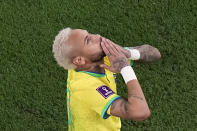 Brazil's Neymar celebrates scoring his side's second goal during the World Cup round of 16 soccer match between Brazil and South Korea, at the Education City Stadium in Al Rayyan, Qatar, Monday, Dec. 5, 2022. (AP Photo/Pavel Golovkin)