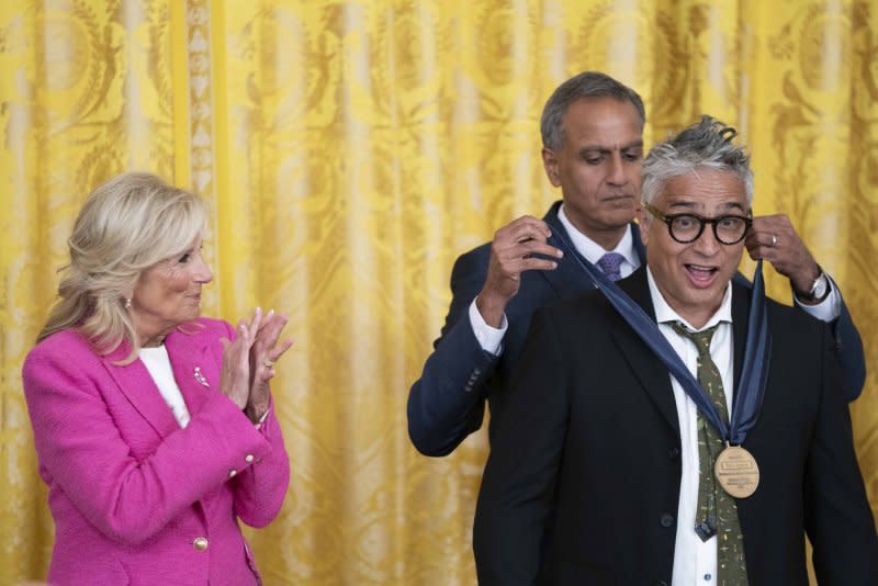 First Lady Jill Biden applauds as Deputy Secretary of the U.S. State Department Richard Verma awards Tony Abeyta a medal during the 2023 International Medal of Arts Ceremony in the East Room of the White House in Washington, D.C. The award, selected by the U.S. State Department as part of the Art in Embassies program, honors those who have aided in promoting cultural diplomacy efforts worldwide. Photo by Bonnie Cash/UPI