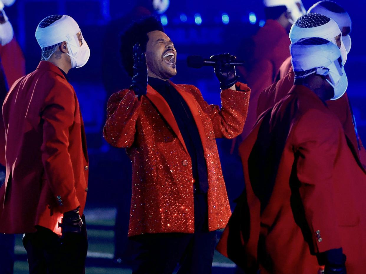 <p>The Weeknd on stage at the Super Bowl in Tampa</p> (Getty Images)