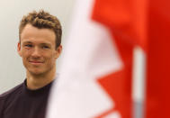 07 Jul 2001: Simon Whitfield of the elite men (CAN) smiles during the Canadian National Anthem after winning the Toronto Triathlon, an International Triathlon Union World Cup event, in the Toronto, Ontario, Canada. DIGITAL IMAGE Mandatory Credit: Brian Bahr/ALLSPORT