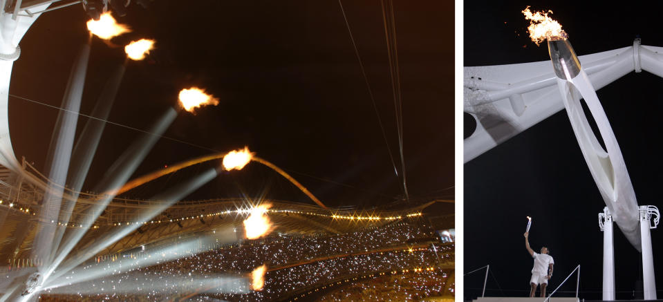 The Olympic cauldron rises in this multiple exposure photo, left, after Nikolas Kaklamanakis, right, lit it during the Opening Ceremony of the 2004 Olympic Games in Athens, Friday, Aug. 13, 2004. The photo at left is a single frame time exposure interrupted at six intervals while the Olympic cauldron rises after being lit. (AP Photos)