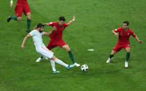 <p>Under pressure: Diego Costa scores a fine solo goal despite being outnumbered 3-to-1 by Portuguese defenders. </p>