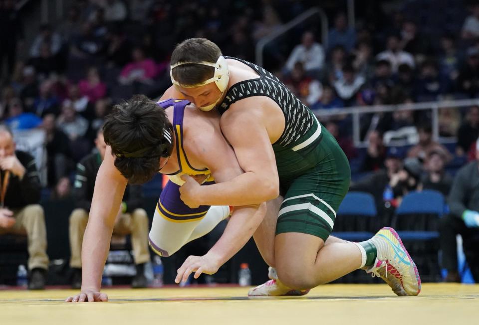 Minisink Valley's Ethan Gallo (top) wrestles Darrien Insognia of Ballston Spa in the Division 1 215-pound championship match at the NYSPHSAA Wrestling Championships at MVP Arena in Albany, on Saturday, February 25, 2023.