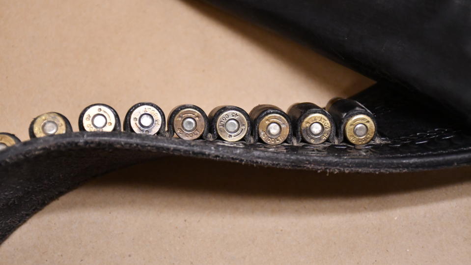 A gun belt containing dummy rounds.