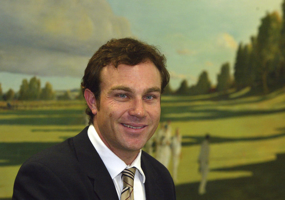 FILE - Australia Cricketer Michael Slater in Sydney, Australia, Wednesday, June 9, 2004, is pictured after announcing his retirement from 1st class cricket. Ex-test cricketer Slater has been remanded in prison while awaiting trial on 19 charges relating to domestic violence and breaches of bail. The 54-year-old Slater was refused bail Tuesday, April 16, 2024, when he appeared in Maroochydore Magistrates Court in Queensland state charged with unlawful stalking or intimidation, breaking into a dwelling with intent at night, common assault, assault occasioning bodily harm and choking or suffocation. (AP Photo/Rob Griffith, File)