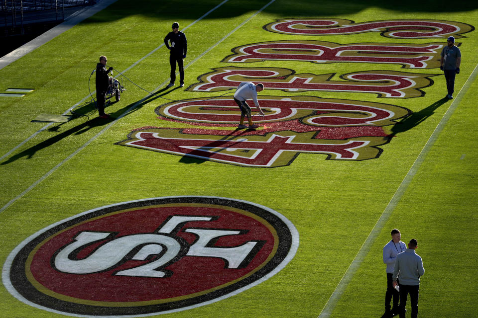 Grounds crew prepare the field outside Allegiant Stadium ahead of the NFL Super Bowl 58 football game, early Saturday, Feb. 3, 2024, in Las Vegas. (AP Photo/Matt York)