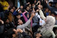 FILE PHOTO: Students of the Jamia Millia Islamia university demonstrate against their Vice Chancellor Najma Akhtar and demand enquiry against police action on students following a protest last month against a new citizenship law, in New Delhi