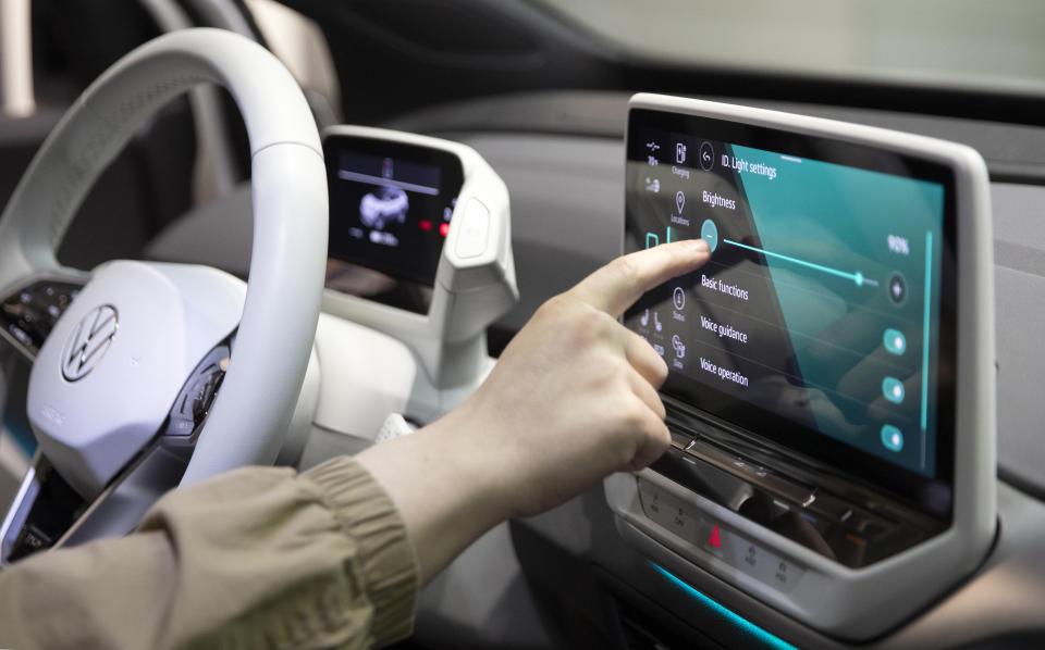 THOUSAND OAKS, CA - JANUARY 19: A man tests the new touchscreen inside the new all-electric Volkswagen ID.4 that is on display inside a dealership on January 19, 2021 in Thousand Oaks, California. (Photo by Josh Lefkowitz/Getty Images)