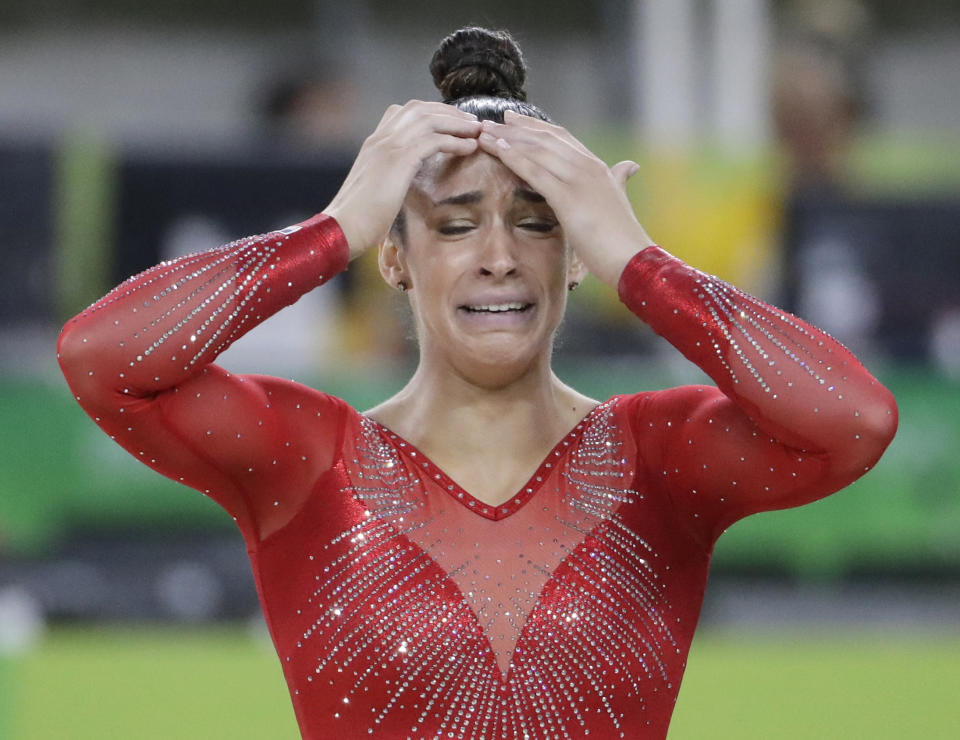 Aly Raisman reacts after winning silver in the women's all around. (AP)