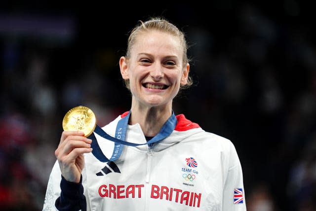 Bryony Page celebrates winning a gold medal following the trampoline gymnastics