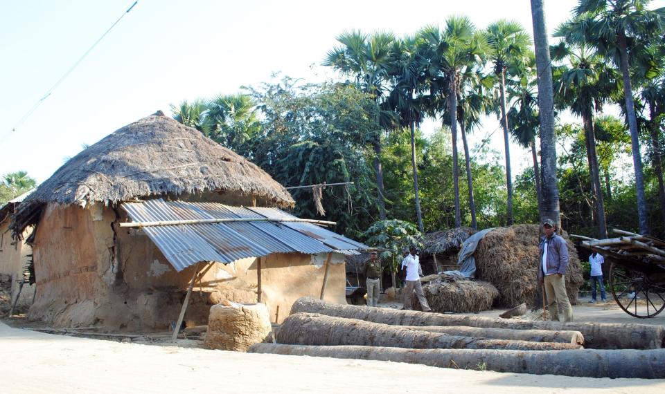 Policemen inspect the site where a woman was gang raped, allegedly on the direction of a village council at Subalpur village, in Birbhum district, about 180 kilometers (110 miles) north of Kolkata, the capital of the eastern Indian state of West Bengal. The woman told police that Monday's attack came as punishment for falling in love with a man from a different community and religion. The case has brought fresh scrutiny to the role of village councils, common in rural Indian, which decide on social norms in the village. (AP Photo)