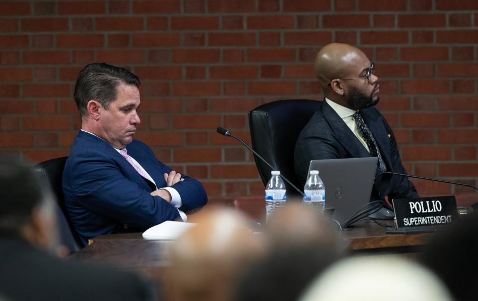 JCPS Superintendent Marty Pollio, left, said the issues surrounding a vote to end transportation for magnet schools in the district has been the most challenging during his tenure as he sat in a school board meeting at the Vanhoose Education Center in Louisville Ky. on April 10, 2024. Ultimately, the board voted to end transportation for all magnet programs except for Central High School and Western High School. Board chair Corrie Shull was at right.