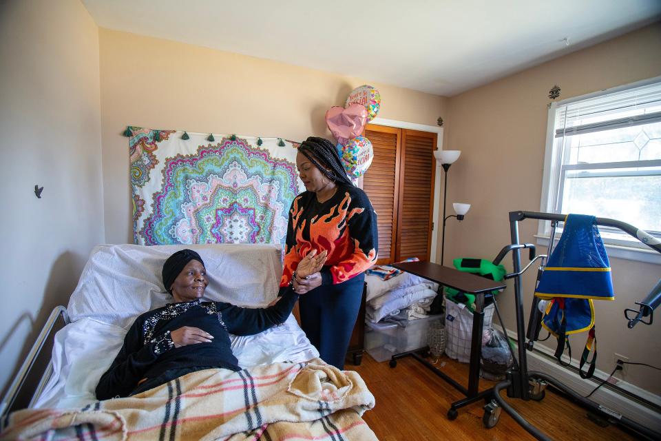 Elizabeth Medler, 63, of Neptune, who has been paralyzed since a November car accident, is cared for by her daughter, Dominique Medler, who took leave from her job to serve as a full-time caretaker, in Neptune, NJ Friday, March 1, 2024.