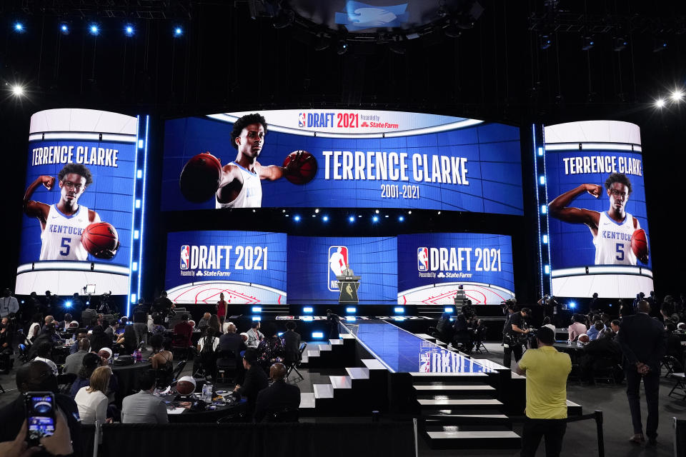 A tribute to former Kentucky guard Terrence Clarke is presented on screens during the NBA basketball draft, Thursday, July 29, 2021, in New York. Clarke died in a car accident in April. (AP Photo/Corey Sipkin)