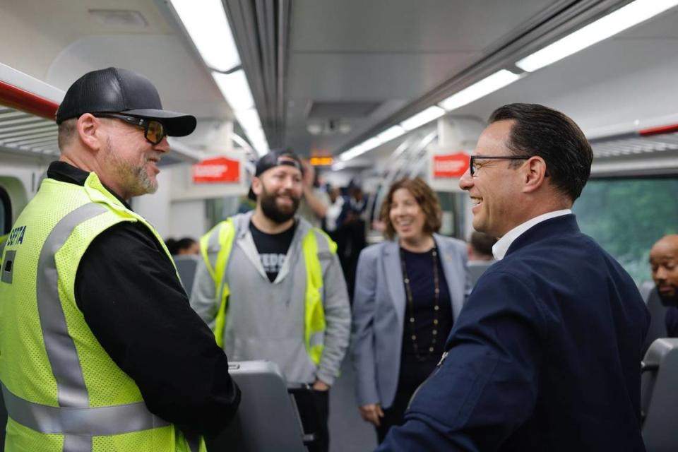 Gov. Josh Shapiro rides a SEPTA train to promote the need for transit funding.