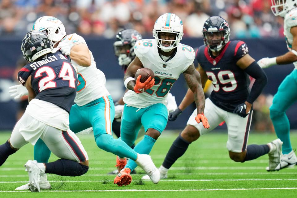 Dolphins running back Salvon Ahmed had 12 touches for 120 scrimmage yards in the first half.