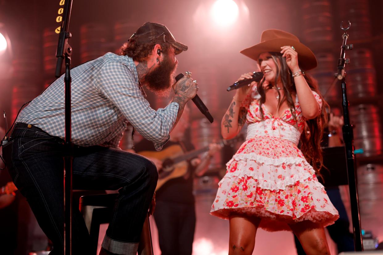 Post Malone and Sierra Ferrell perform onstage for Bud Light's "A Night In Nashville" concert at Marathon Music Works on July 16, 2024 in Nashville, Tennessee.