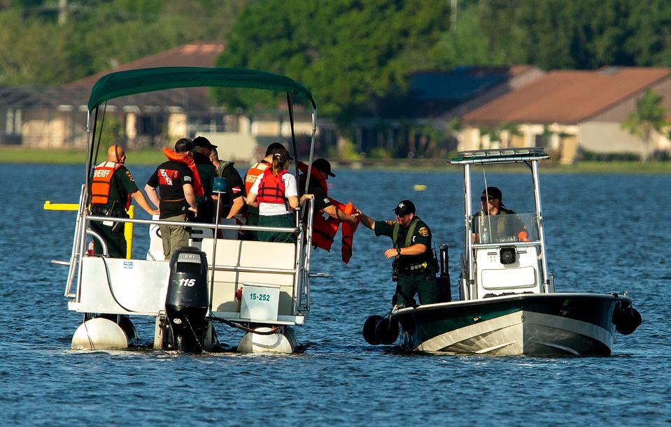 Polk County Sheriff Underwater Search & Recovery Team head toward the search area where an aircraft crashed into Lake Hartridge after colliding with another aircraft this afternoon in Winter Haven Fl  Tuesday March 7,2023.There has been one confirmed fatality and divers are searching for the other plane which sank.Ernst Peters/The Ledger