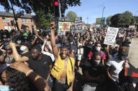 People protest under the slogan Black Lives Matter rally outside the US Embassy in Dublin, Ireland, Monday June 1, 2020, following the death of George Floyd in Minneapolis, USA. The recent killing of George Floyd in Minneapolis, USA, has led to protests in many countries, and across the U.S. (Niall Carson/PA via AP)