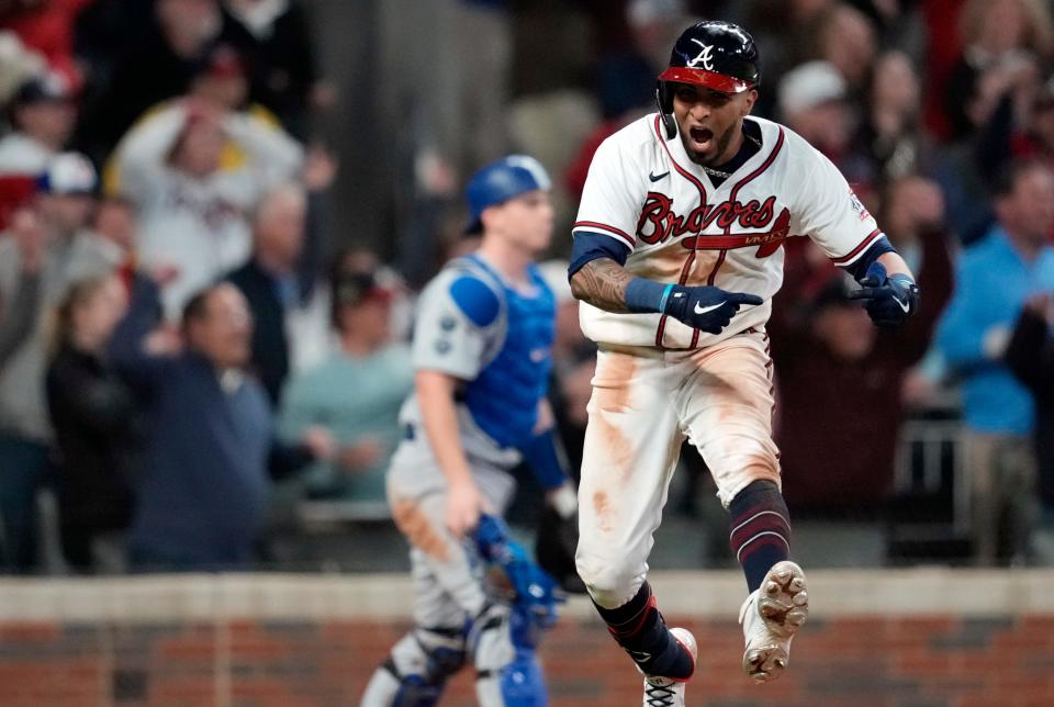 Eddie Rosario celebrates his walk-off single.