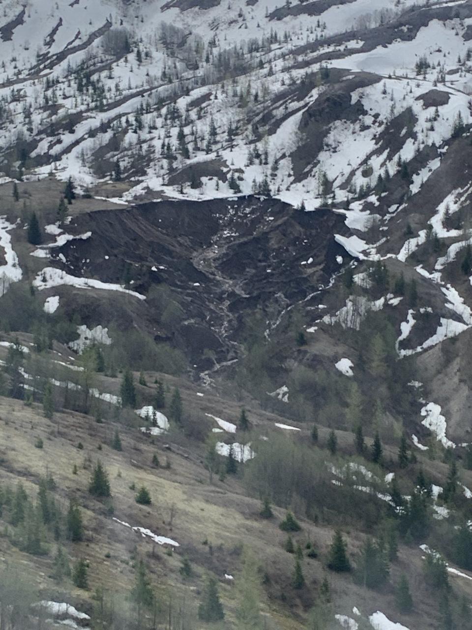 The stranded people and a dog were evacuated by a King County Sheriff's Office helicopter Monday morning.