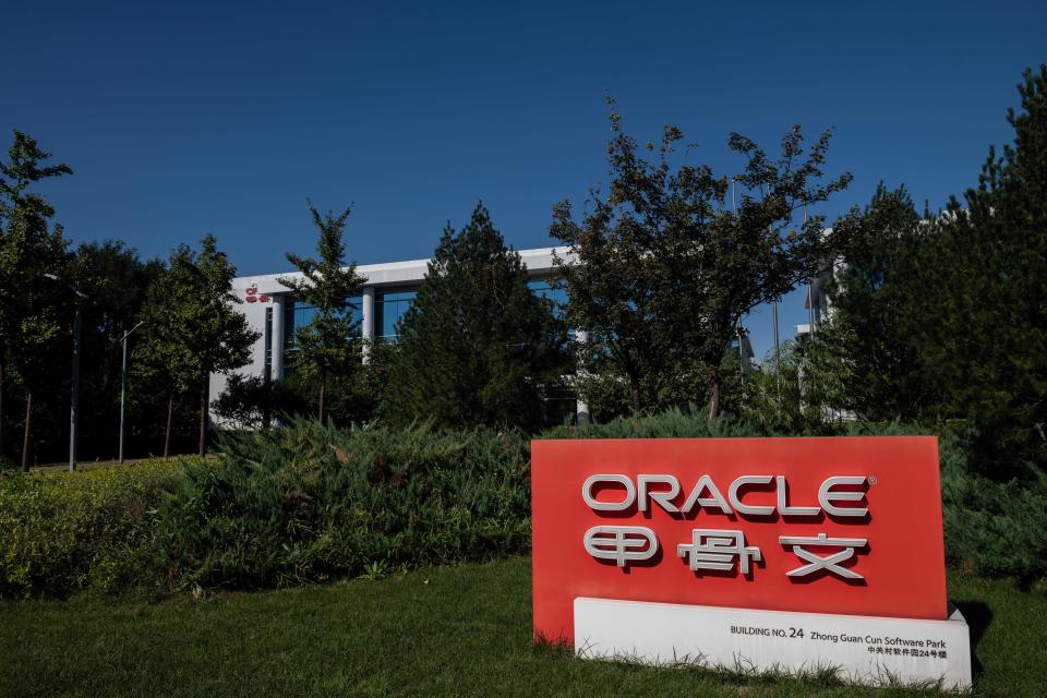 Oracle company signage is seen in front of the US-based technology company's office building in Beijing on September 16, 2020. - Silicon Valley tech giant Oracle is "very close" to sealing a deal to become the US partner to Chinese-owned video app TikTok to avert a ban in the United States, President Donald Trump said. (Photo by NICOLAS ASFOURI / AFP) (Photo by NICOLAS ASFOURI/AFP via Getty Images)