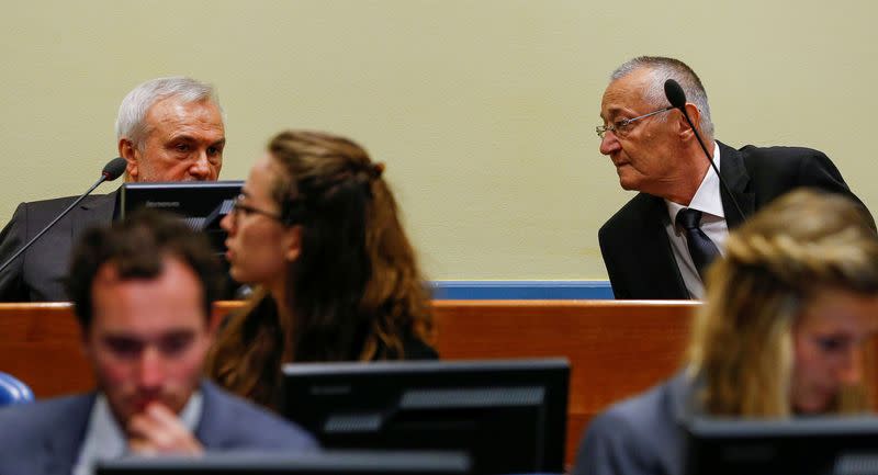 FILE PHOTO: Jovica Stanisic (L) and Franko Simatovic appear in court for their re-trial at the United Nations tribunal for the former Yugoslavia in The Hague