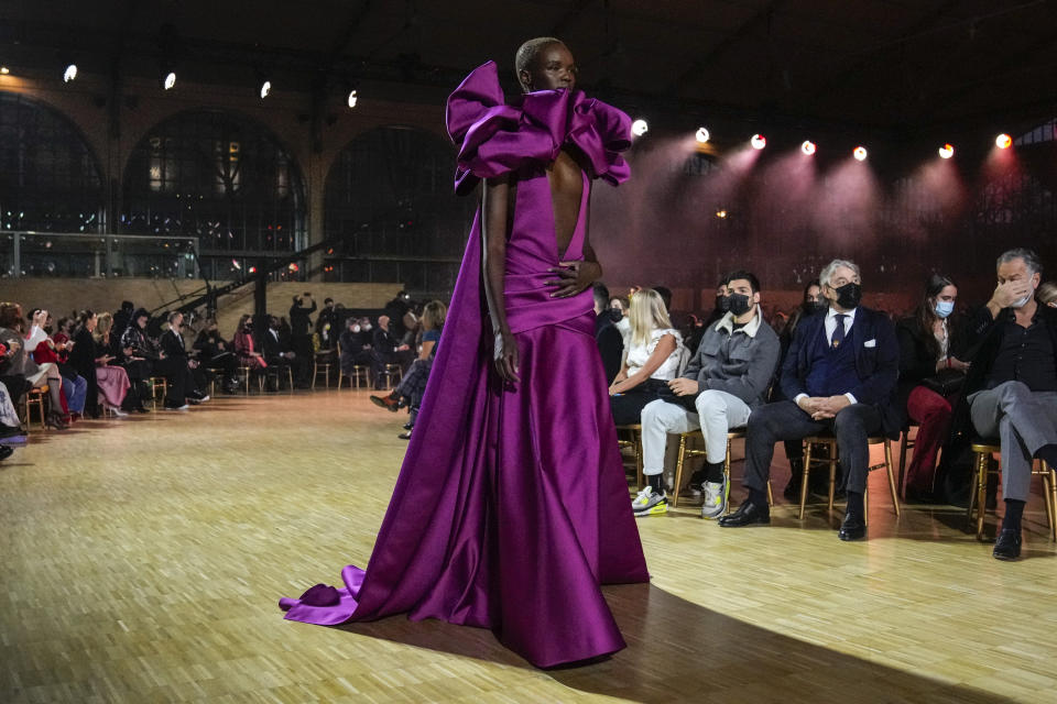 A model wears a creation for the Elie Saab Spring-Summer 2022 Haute Couture fashion collection, in Paris, Wednesday, Jan. 26, 2022. (AP Photo/Francois Mori)