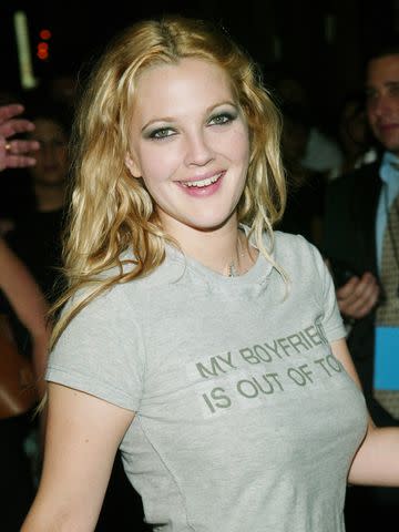 <p>Evan Agostini/Getty</p> Drew Barrymore makes a fashion statement at the "Charlie's Angels: Full Throttle" premiere and afterparty on June 25, 2003