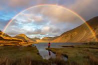 <p>The coloured stripes of a rainbow arch over Wast Water in Cumbria. (Mark Gilligan)</p>