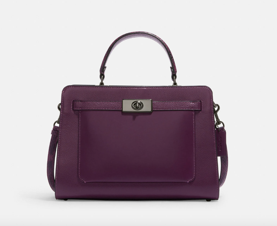 Lane Carryall in QB/Boysenberry (Photo via Coach Outlet)