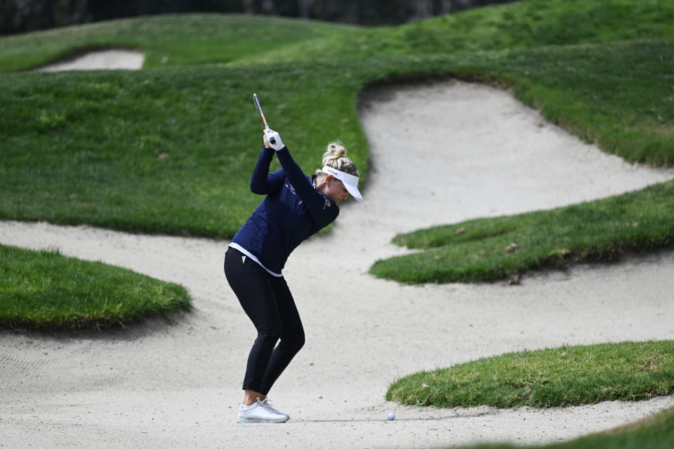 Nanna Koerstz Madsen, of Denmark, hits out of the bunker on the first hole during the third round of the JTBC LPGA golf tournament, Saturday, March 26, 2022, in Carlsbad, Calif. (AP Photo/Denis Poroy)