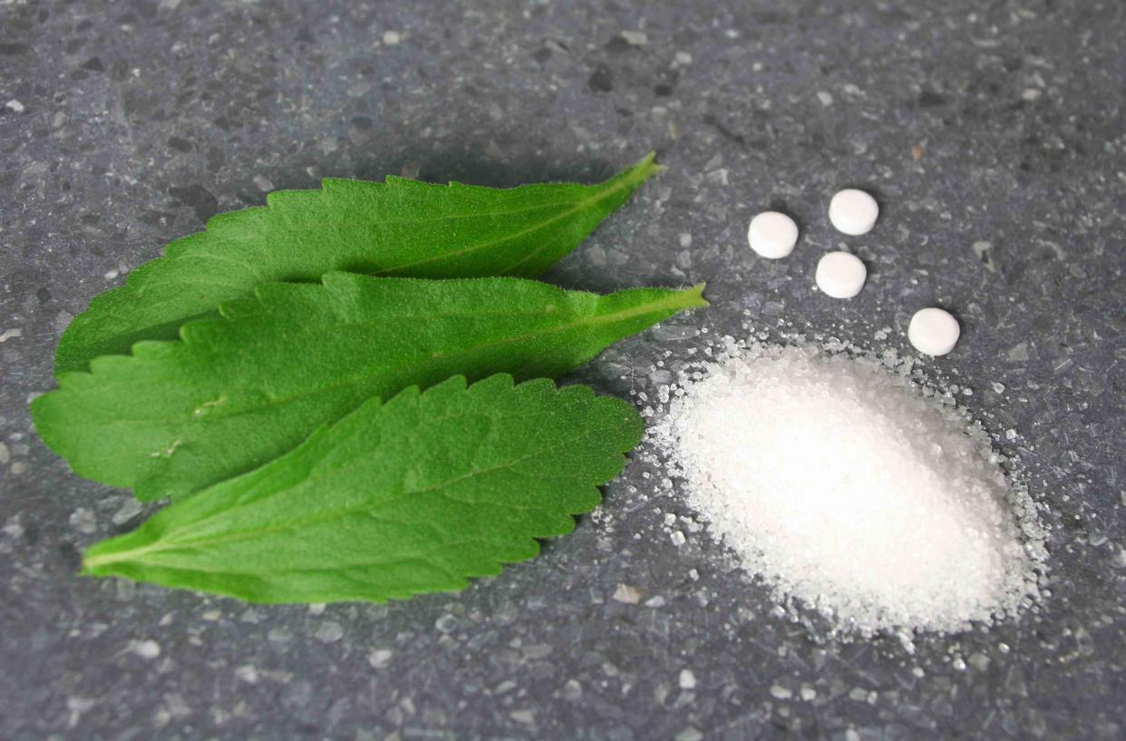 <p>dirkr/Getty Images</p> Stevia leaves, powder and tablets 