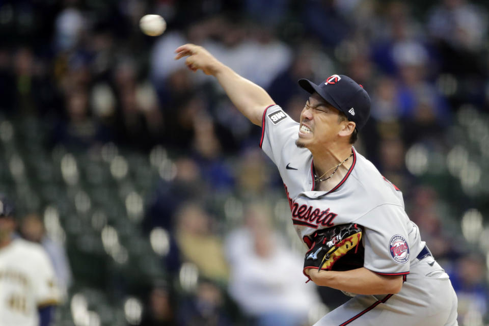 Minnesota Twins' Kenta Maeda pitches during the first inning of an Opening Day baseball game against the Milwaukee Brewers Thursday, April 1, 2021, in Milwaukee. (AP Photo/Aaron Gash)