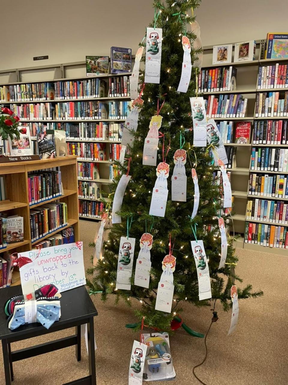 An Angel Tree stands in the Woodville library branch from a past year. This year's tree should be ready by the weekend with new cards to select for 2022.