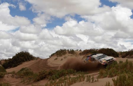 Dakar Rally - 2017 Paraguay-Bolivia-Argentina Dakar rally - 39th Dakar Edition - Fifth stage from Tupiza to Oruro, Bolivia 06/01/17. Alberto Rodrigo Gutierrez of Bolivia drives his Toyota with his copilot Joan Rubi. REUTERS/Ricardo Moraes