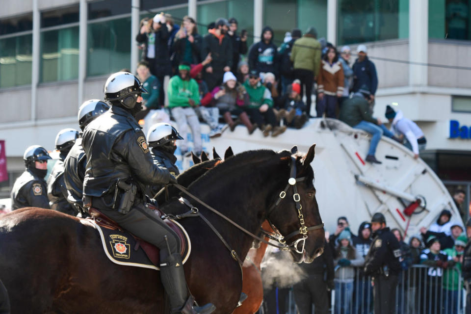 Police watch Eagles fans during celebrations. (Getty)