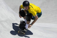 Kieran Woolley of Australia competes in the men's park skateboarding finals at the 2020 Summer Olympics, Thursday, Aug. 5, 2021, in Tokyo, Japan. (AP Photo/Ben Curtis)