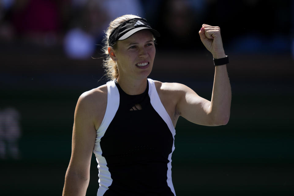 Caroline Wozniacki, of Denmark, celebrates after defeating Zhu Lin, of China, at the BNP Paribas Open tennis tournament, Thursday, March 7, 2024, in Indian Wells, Calif. (AP Photo/Ryan Sun)