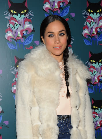 <p>Introducing Meghan like you’ve never seen her before. Clad in Miu Miu for the Miu Miu Women’s Tales 7th Edition ‘Spark & Light’ Screening in 2014, the former actress opted for a low plait with a middle parting. Love. <em>[Photo: Getty]</em> </p>