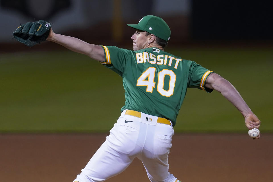 Oakland Athletics' Chris Bassitt pitches to a Los Angeles Angels batter during the seventh inning of a baseball game in Oakland, Calif., Thursday, May 27, 2021. (AP Photo/Jeff Chiu)