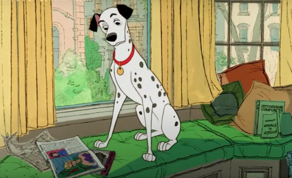 Pongo sitting at the window of Roger's apartment in Disney's "101 Dalmations"