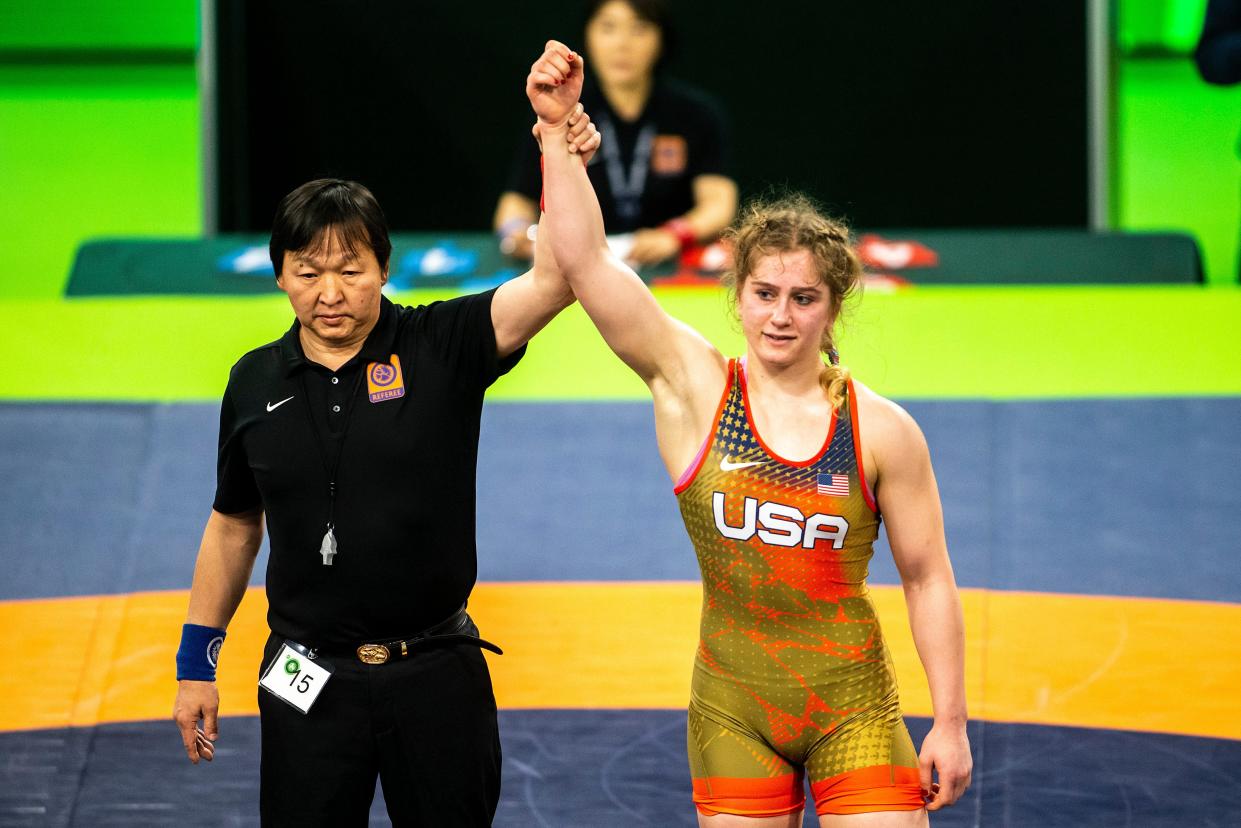 Amit Elor has her hand raised after scoring a decision during the United World Wrestling women's freestyle World Cup on Dec. 10, 2022.