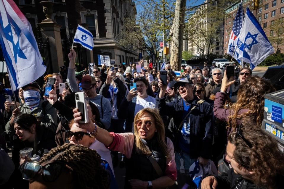 Pro-Israel demonstrators chant “Shame!” in support of Davidai, who was denied access to the main campus to prevent him from accessing the lawn currently occupied by anti-Israel student demonstrators. AP