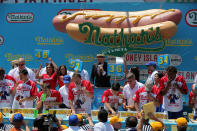 <p>People compete in Nathan’s Famous Fourth of July International Hot Dog-Eating Contest at Coney Island in Brooklyn, New York City, U.S., July 4, 2017. (Andrew Kelly/Reuters) </p>